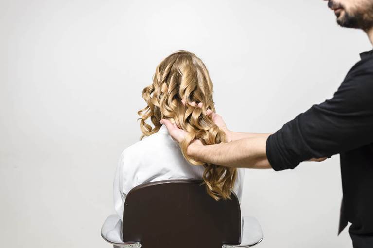 Rake fingers through the hair to get rid of any overly structured curls